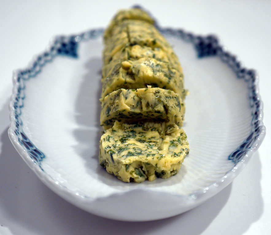 Homemade butter, sour cream, herb butter and spreadable butter